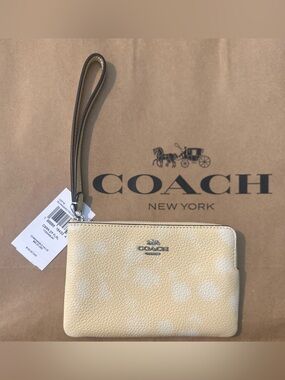 🍁Coach Wristlet in Cream Polka Dot